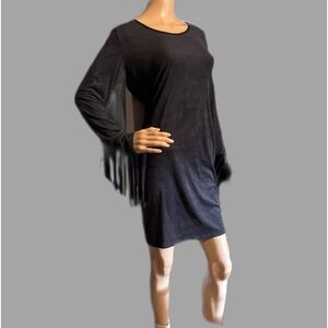 Custom, black, suede like material, medium. Fringe down both arms.